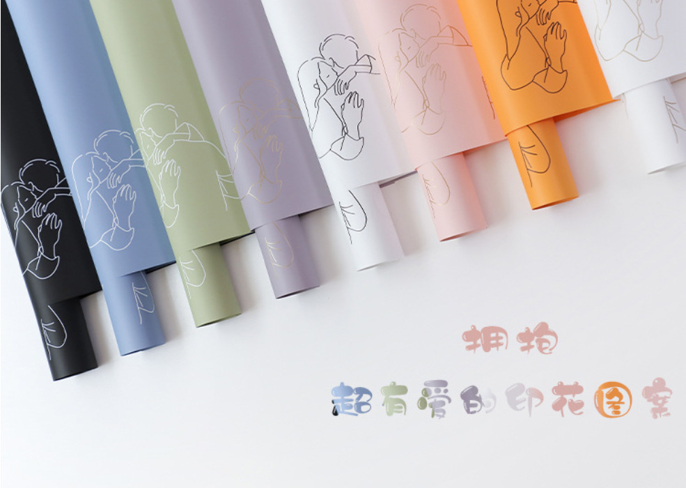 厂家直销简爱拥抱情人节花束包花纸防水鲜花礼品包装纸diy花艺材