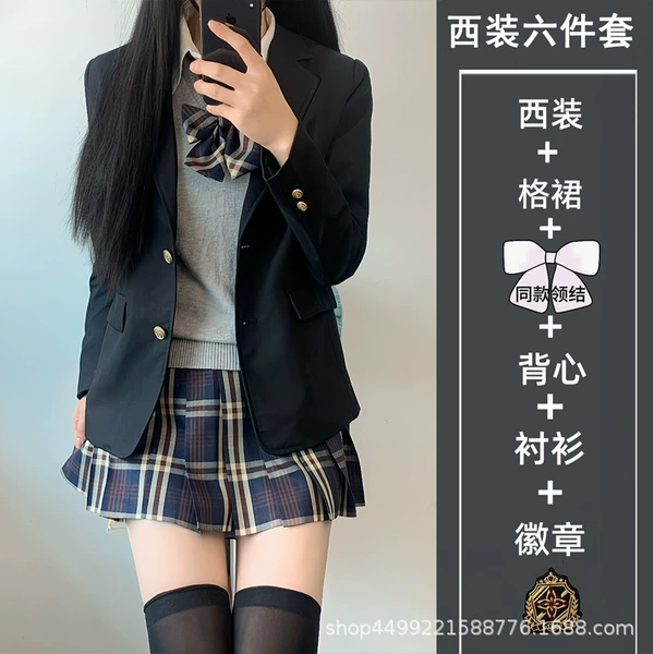 Vest, shirt, bow tie, badge