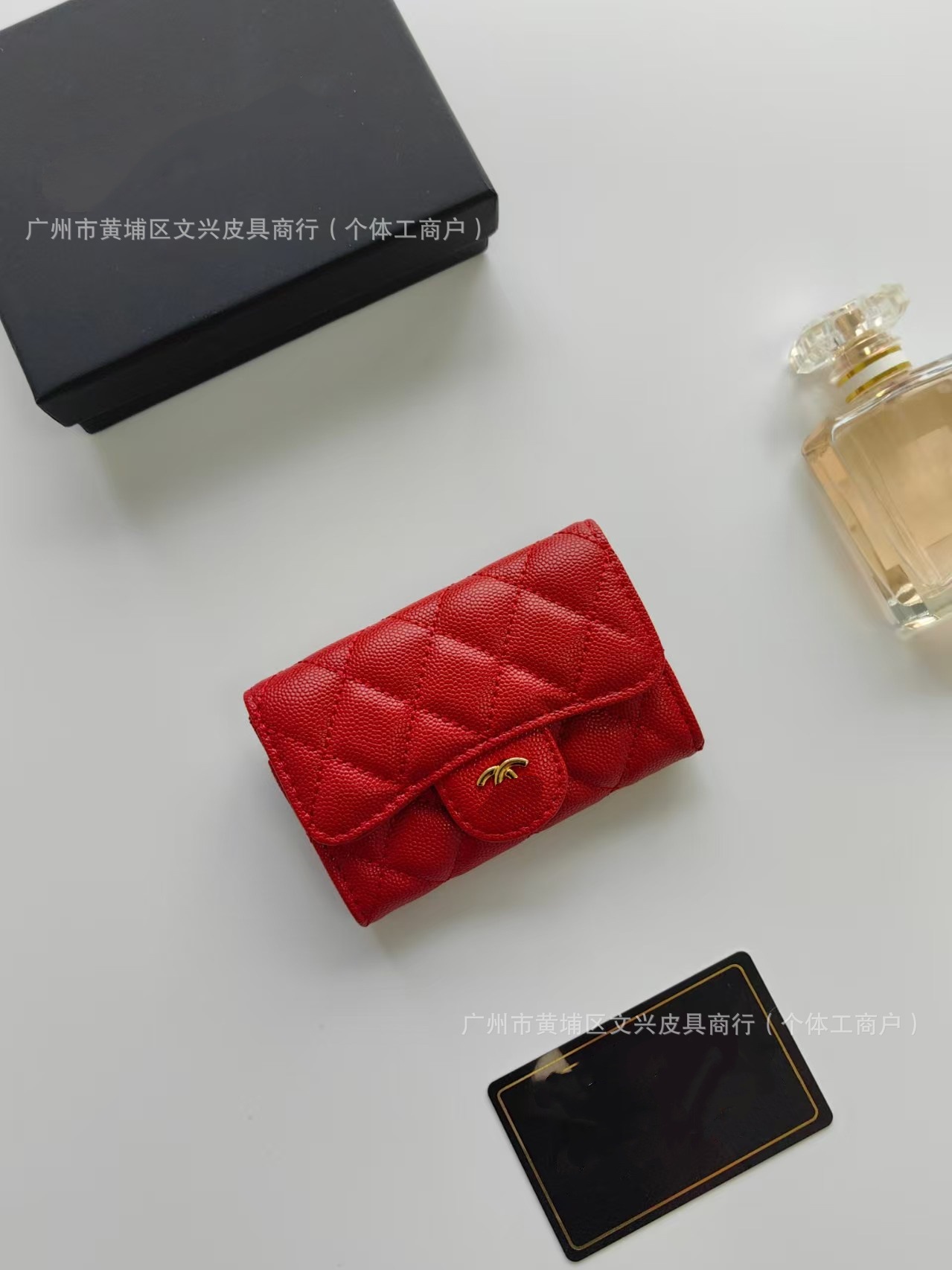 Cartera de cuero corta de diamante de alta calidad, nicho casual, gran capacidad, exquisita, pequeña bolsa de cambio de hebilla fragante.