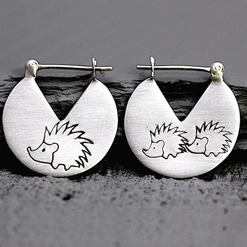 New Simple Lotus Leaf Type Alloy Cartoon Hedgehog Women's Earrings Wholesale display picture 1