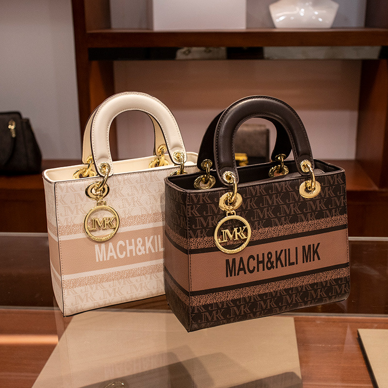 Hong Kong marcas de alta marcas de cuero real Diana bolsa para mujeres 2023 nueva moda alta sensación de hombro grande bolso de mano de mujer