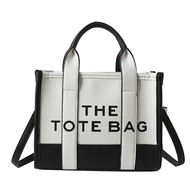 Bolso tote de comercio exterior para mujer 2023, nuevo bolso de mano moderno europeo y americano, bolso bandolera con estampado de letras y bloques de color.
