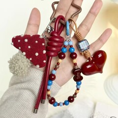 アンコラの赤いファッションのレトロなキノコのカバンは甘くて可愛いです。