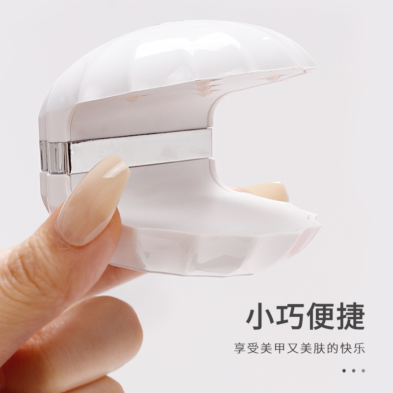 Nueva máquina de fototerapia de uñas Shell de uñas de secado rápido llevó la luz no negro mano pequeña portátil esmalte de uñas pegamento lámpara de hornear