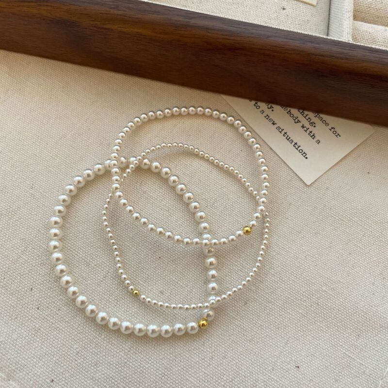 S925 Sterling Silver Simple Shijia Zhengyuan Gold Beads Pearl Elastic Bracelet Female Niche All-match High-end Blogger Same Style S925 Sterling Silver Simple Shijia Zhengyuan Gold Beads Pearl Elastic Bracelet Female Niche All-match High-end Blogger Same Style