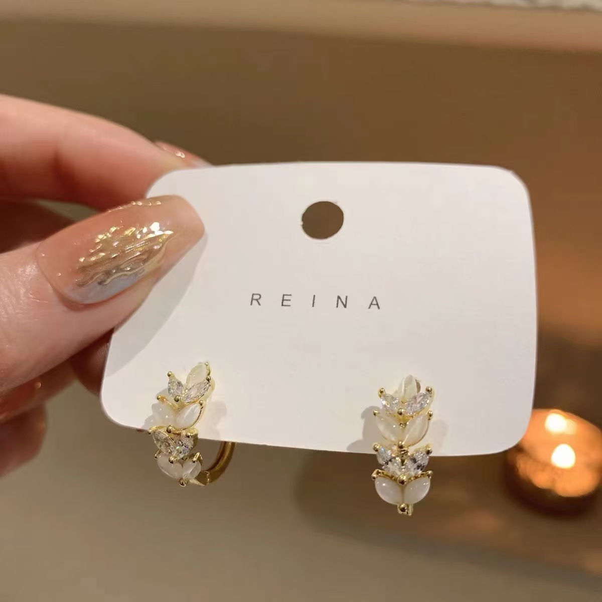 Venta caliente transfronteriza, diseño de nicho de lujo ligero, hebillas de oreja de trigo de circón, pendientes de sentido avanzado de moda, pendientes exquisitos de todo fósforo