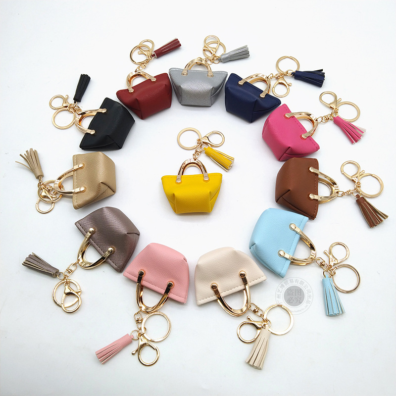 Llavero para mujer, bolso, colgante, joyería, mini monedero de almacenamiento de cuero lindo europeo y americano
