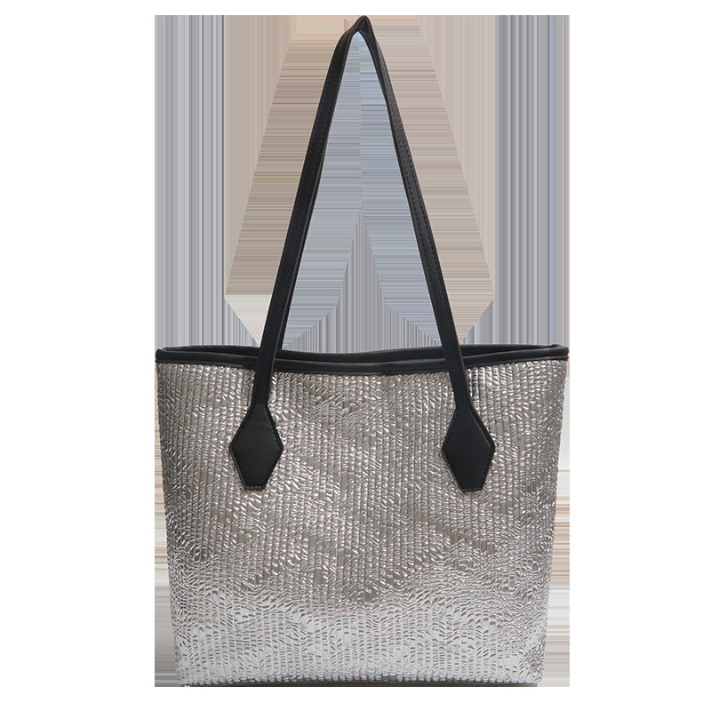 Bolsa de gran capacidad para mujeres 2026 nuevo estilo extranjero tejido de hombro brazo bolso de mano para salir bolsa de viaje