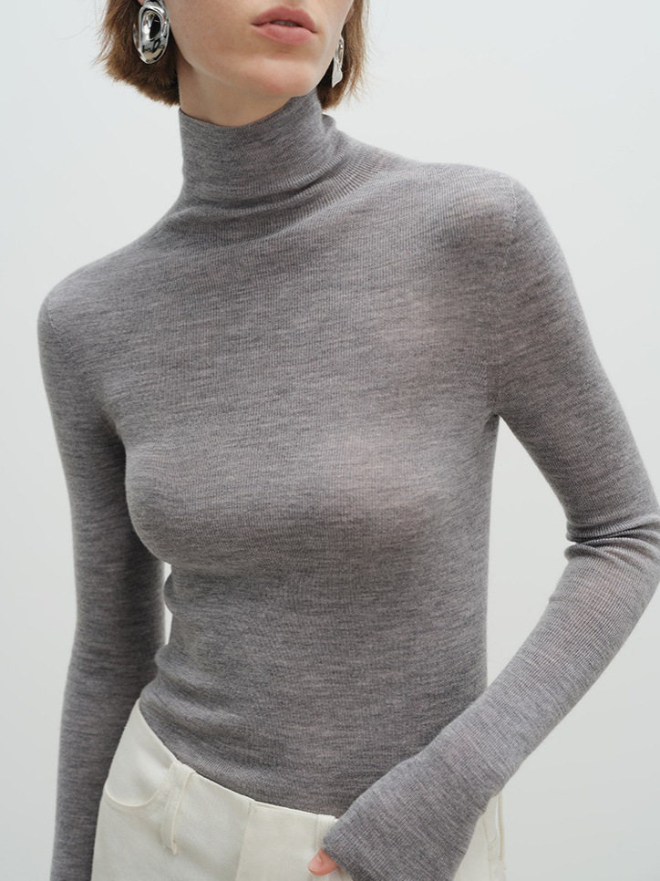 揚子120S極細ウール雲柔感シームレス一体多襟タイプのニット上着の女性