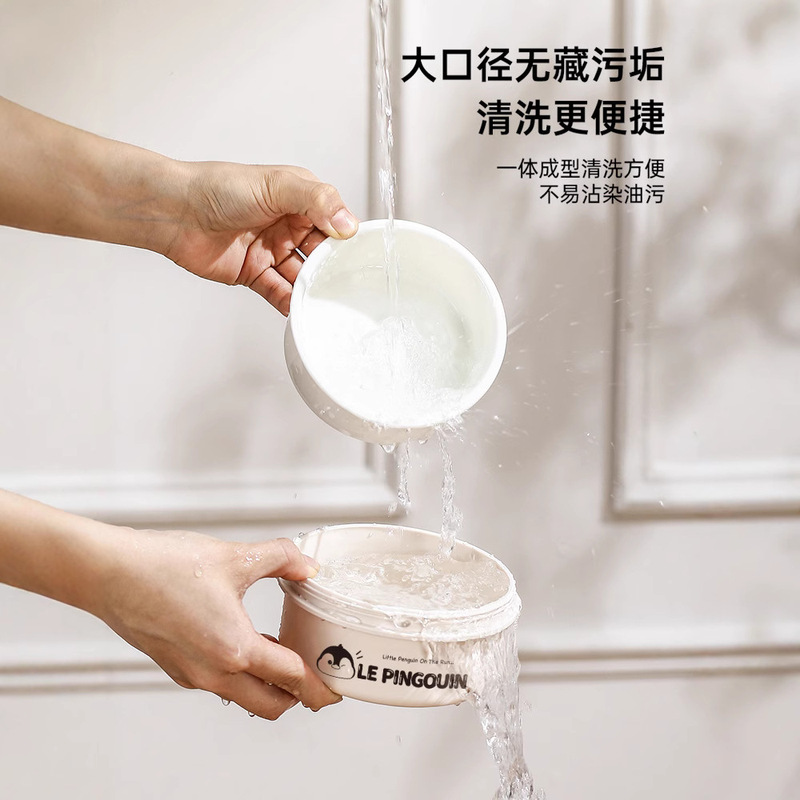 陶磁器の内胆保温弁当箱のサラリーマンは電子レンジで2025の新型を加熱します。|undefined