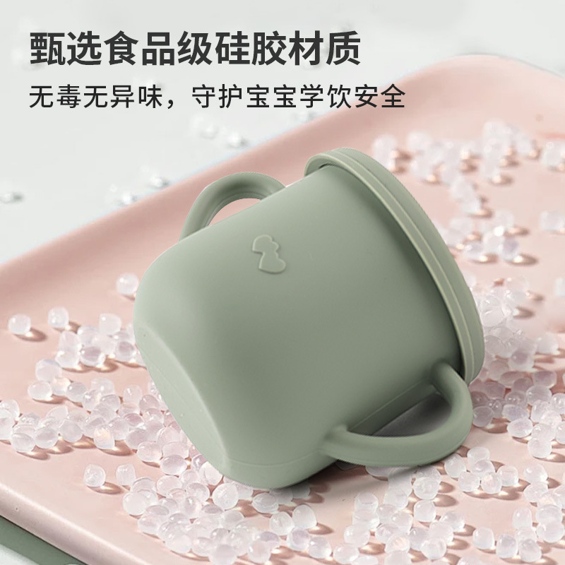 Taza de agua de paja de silicona para niños de grado alimenticio Taza de agua a prueba de caídas Taza de agua de silicona binaural para bebés Taza de silicona para aprender a beber