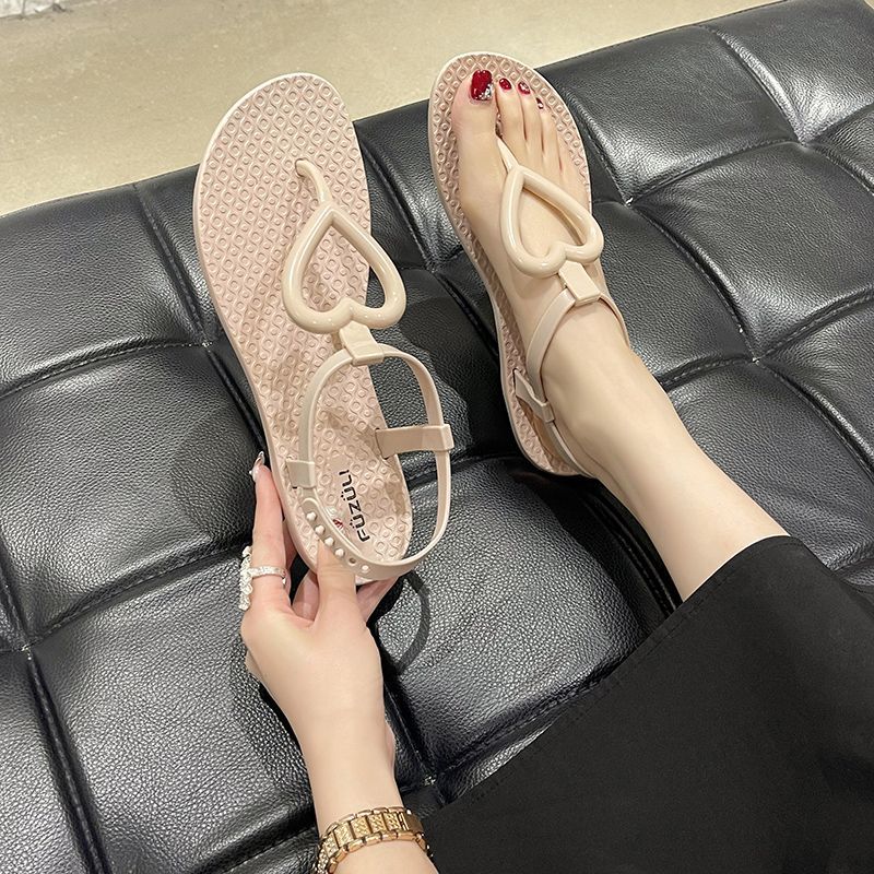 Sandalias planas con chanclas de verano para mujeres francesas 2020 nuevas sandalias coreanas en espina zapatos de playa romanos de todo fósforo para mujeres