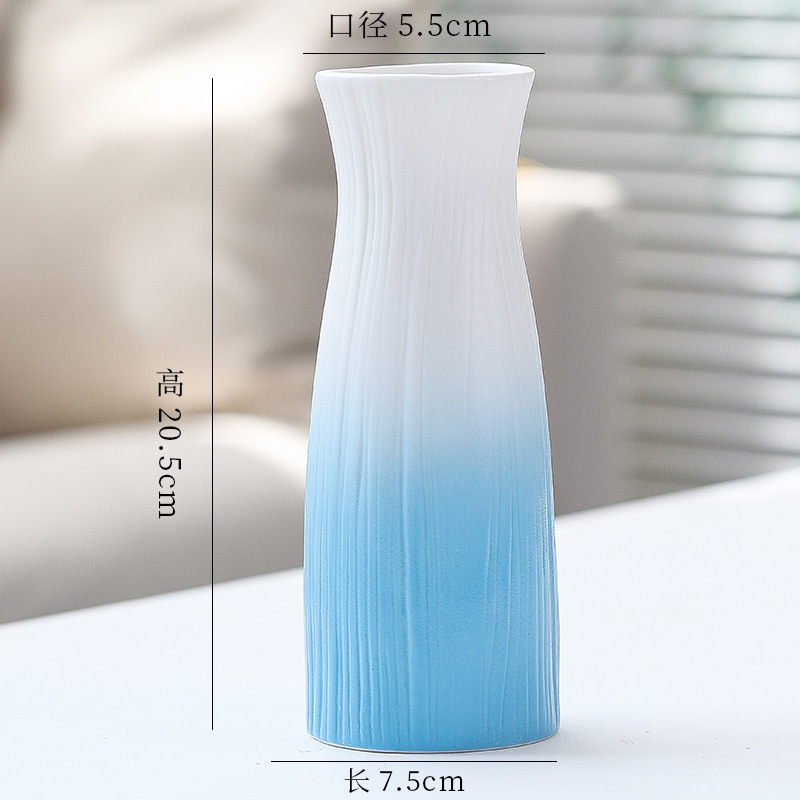 シンプルな現代の満天星陶磁器の花瓶の置物の客間の白い磁器の小さい清新な乾いた花の生け花の創意の陶磁器の花器|undefined