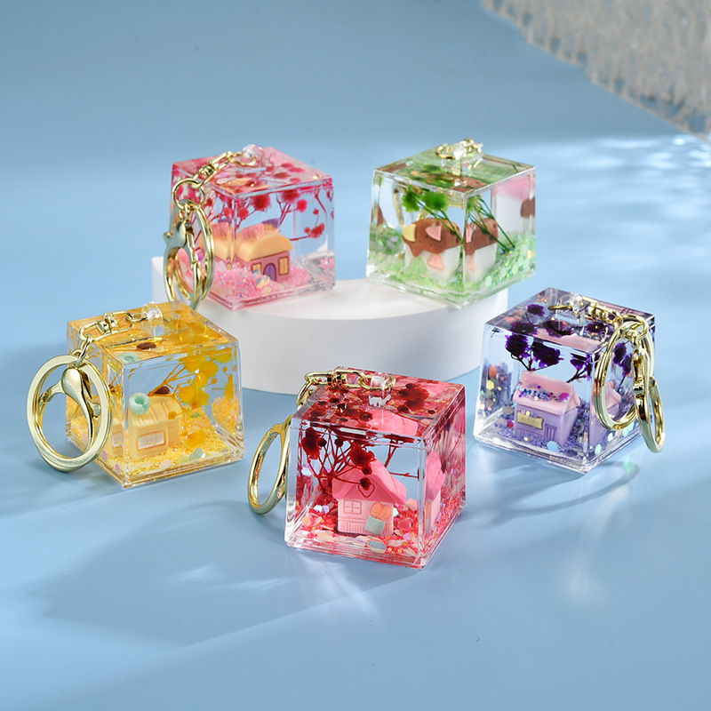 Online celebrity quicksand oil bottle pendant Qixi couple key pendant backpack accessories car small gift ornaments wholesale