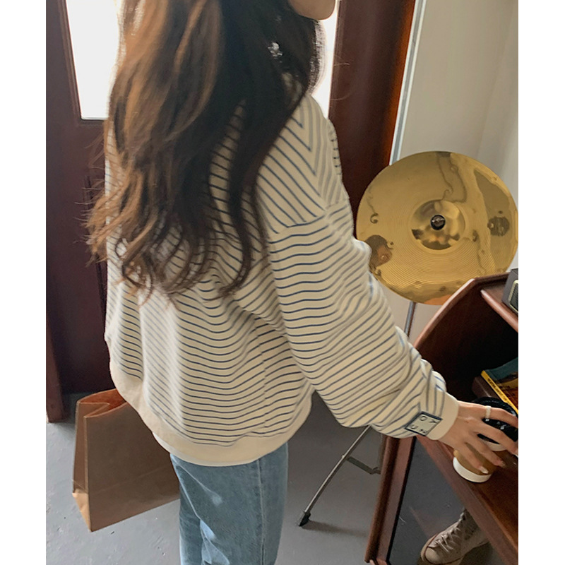 Selección estricta manga fuera del hombro suéter de manga larga a rayas diseño de nicho de las mujeres adelgazamiento Oversize primavera y verano transfronterizo Top Moda