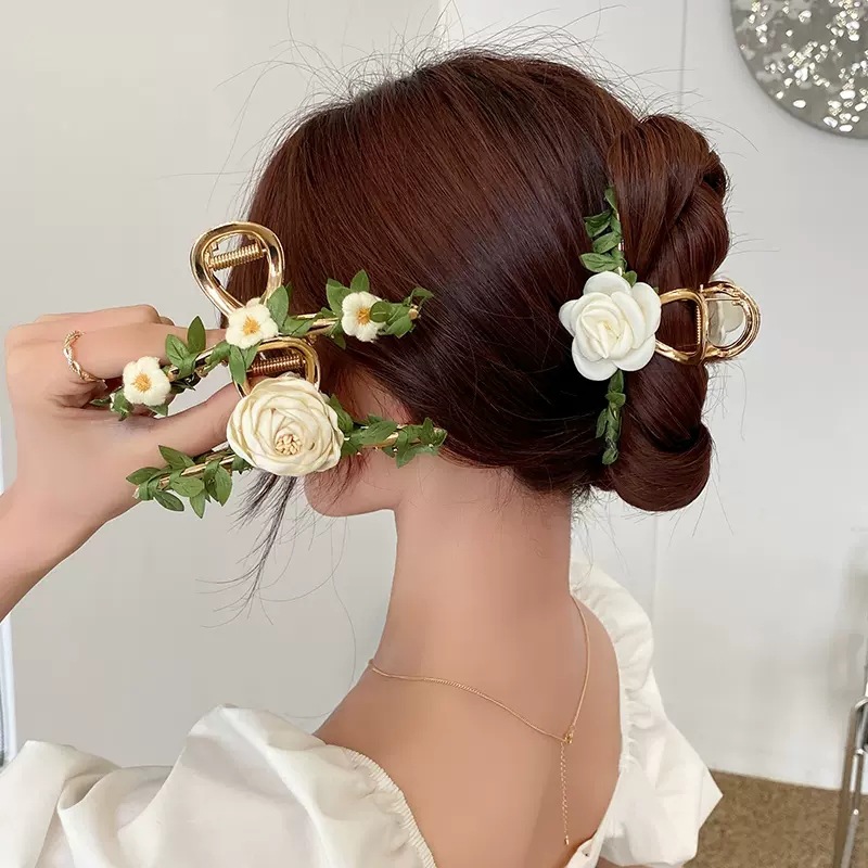 Mujeres Elegante Dulce Flor Aleación Garras De Pelo display picture 1