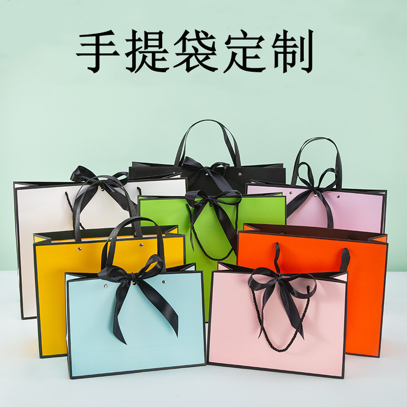 手提袋服装店购物衣服加厚边框白卡牛皮纸袋化妆品小清新礼品袋