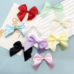 新しいポリエステルのリボンの布芸の蝶結びのアクセサリーの部品のdiyの頭飾りの髪の輪のアクセサリの服の贈り物の箱の装飾