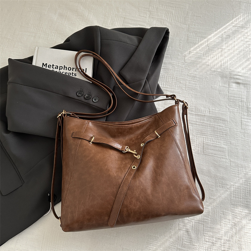 Versátil gran capacidad retro 2024 nuevo otoño invierno ocio de color sólido de hombro simple de doble portátil de hombro para viajar bolso de hombro suave