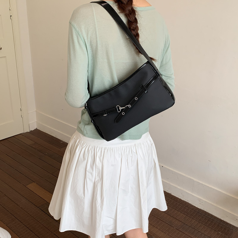 Textura transfronteriza bolso de hebilla de cuero para mujeres 2026 nueva moda diaria bolso de brazo de viaje popular bolso retro