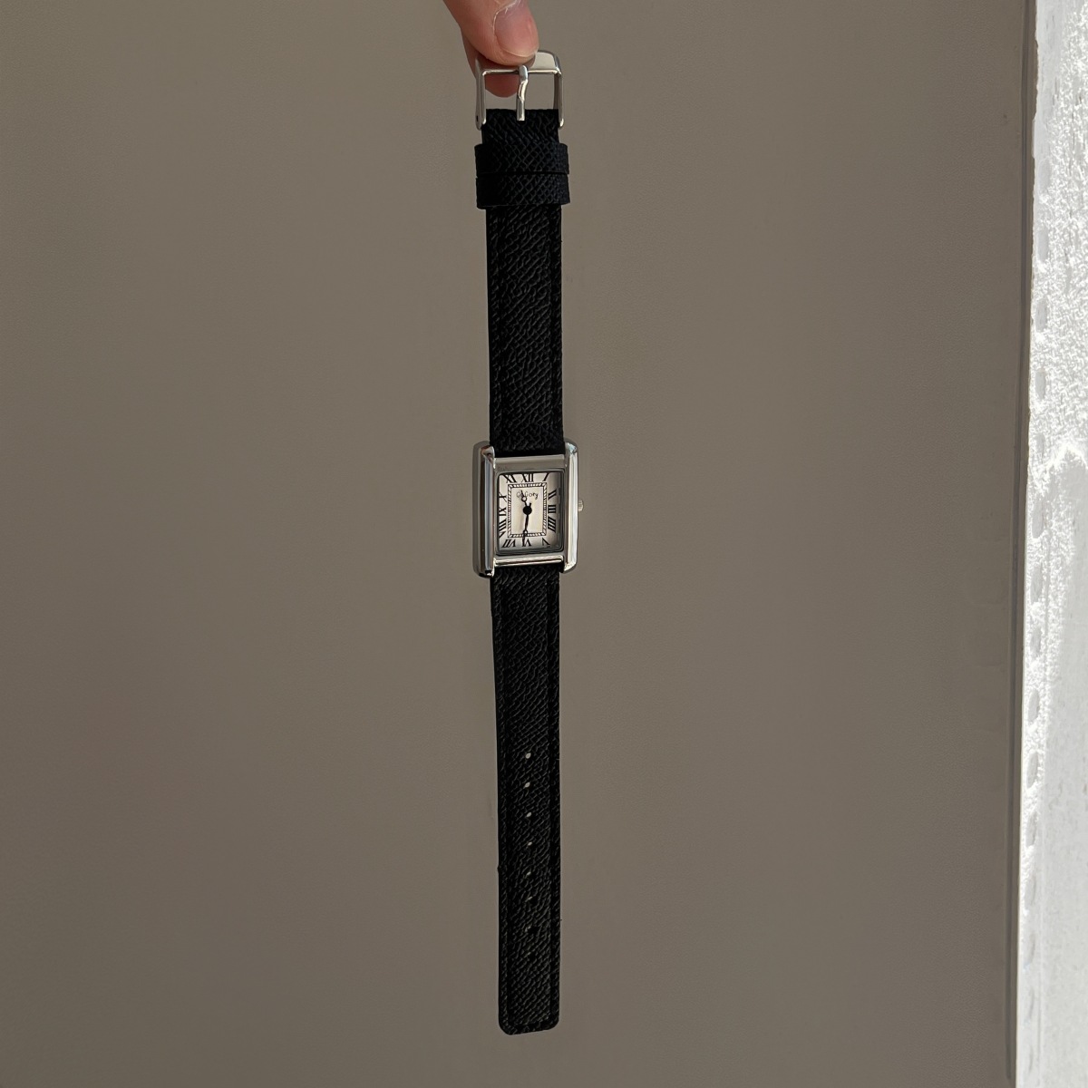 Black belt silver frame white surface