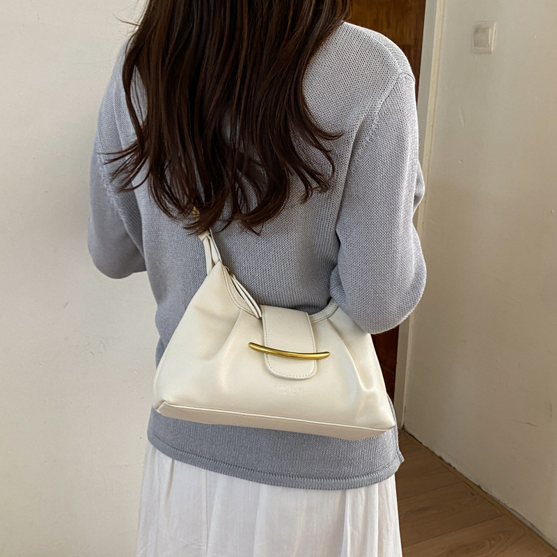 La versión coreana de nicho Zhong commuting bolsas de bolsillo superfuego 2026 verano nuevo estilo diario ocio de moda extranjera mochila de hombro