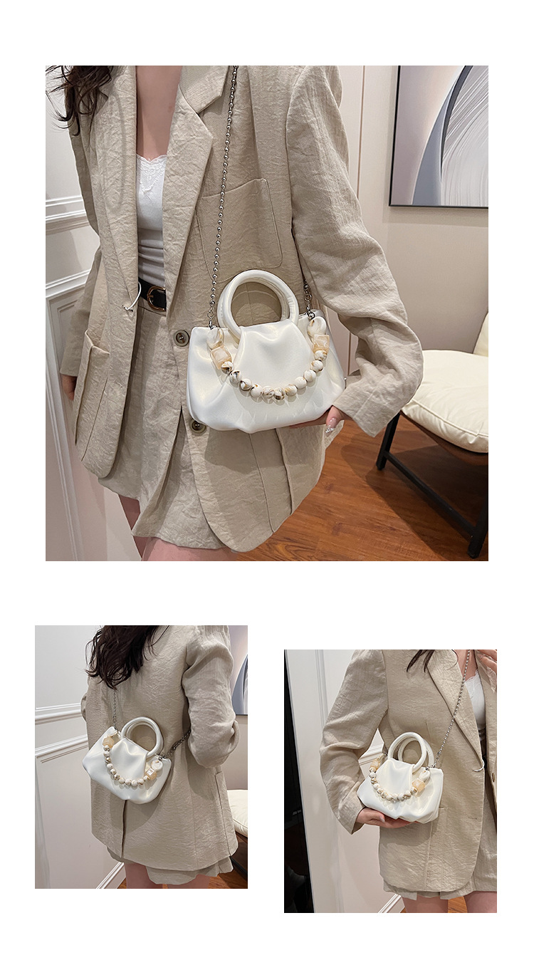High end handbag for women in 2024, new niche design, summer handheld pleated chain strap, crossbody cloud bag_voghion.com