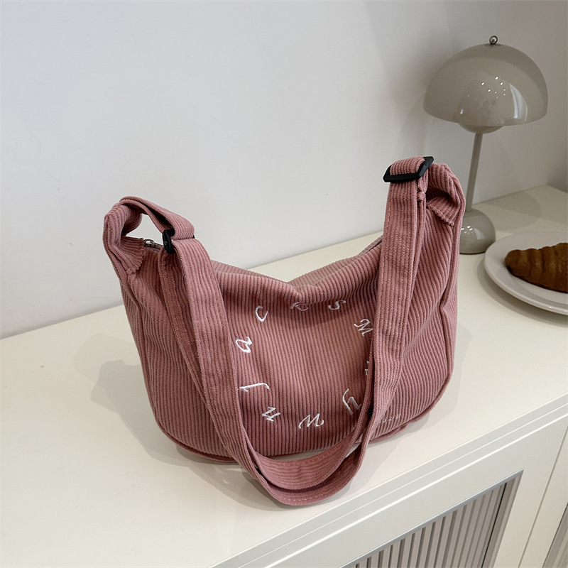 2024 invierno nuevo diseño de nicho, bolso de gran capacidad, bolso de hombro de moda simple, mochila casual simple