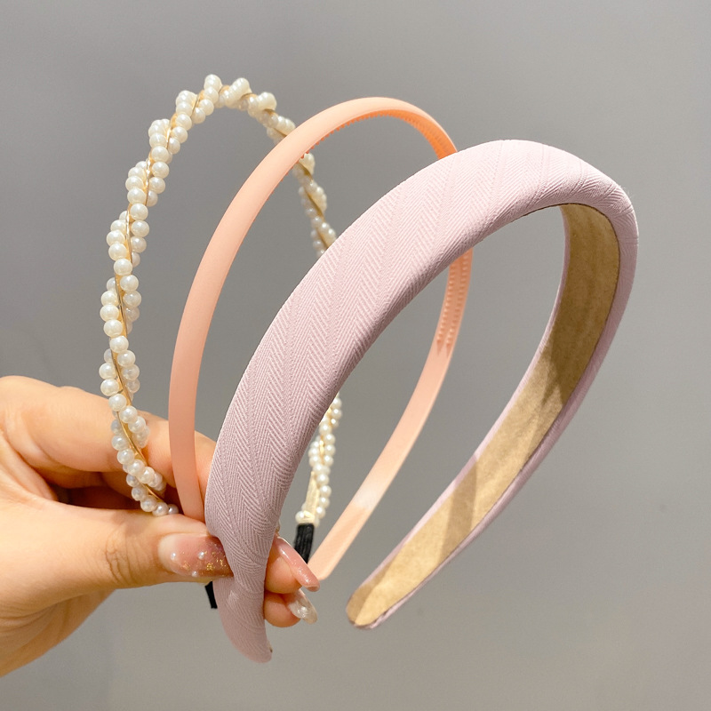 A principios de la primavera, la banda de cabello para mujeres en línea, 2025 nuevo lavado de cara de presión de tarjeta de cabello para el cabello, banda de cabello de perlas, banda de cabello para mujeres.