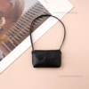 Small black leather bag