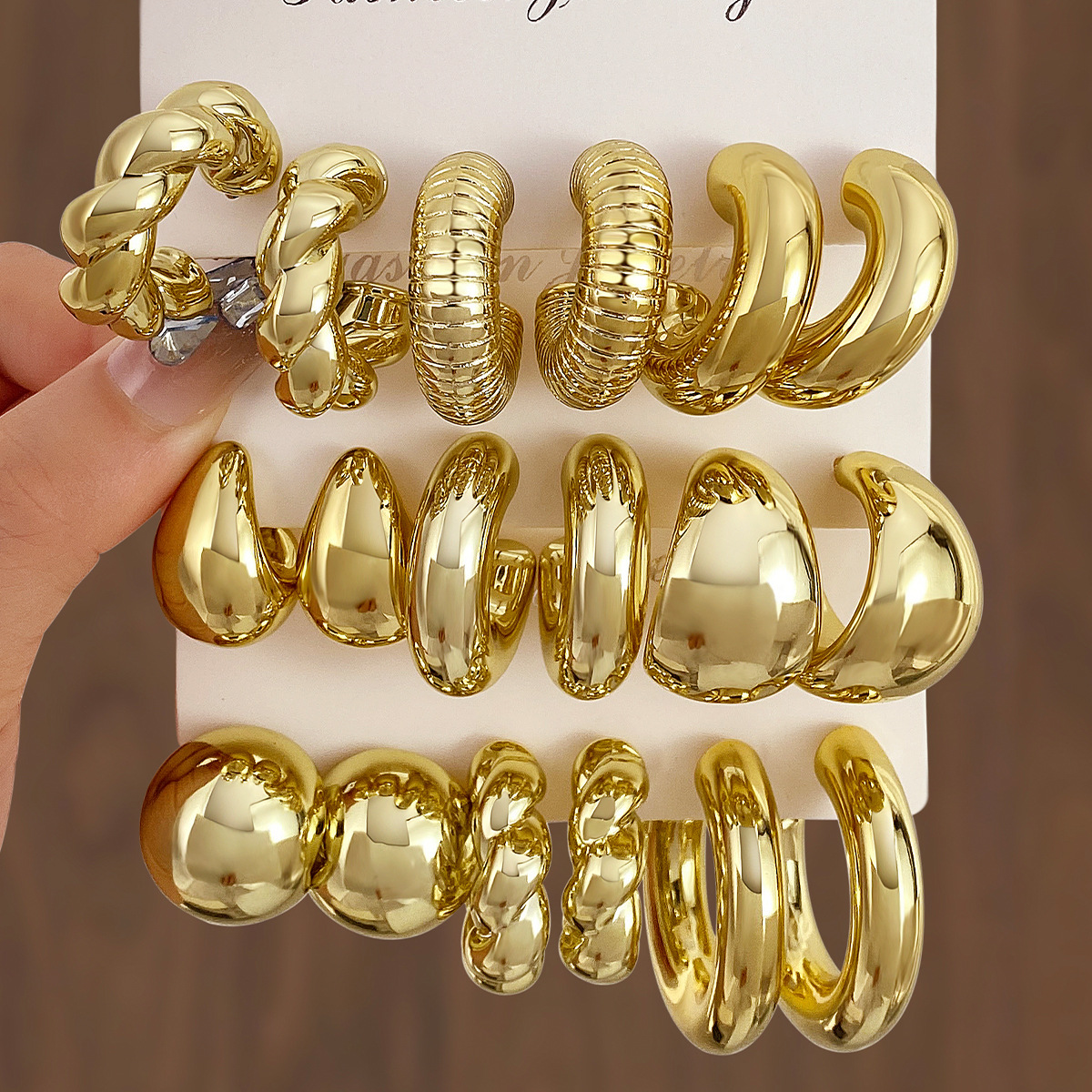 Fashionable earrings drop-shaped
