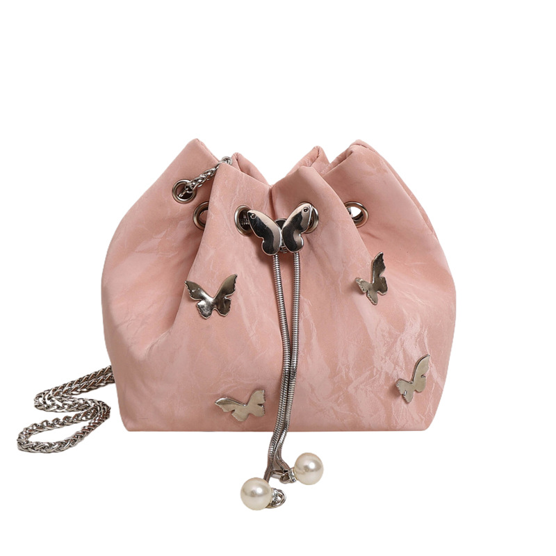 Otoño popular y simple 2024 tira la personalidad mariposa metálica nueva moda bolso de hombro bolso de mujer cadena mochila