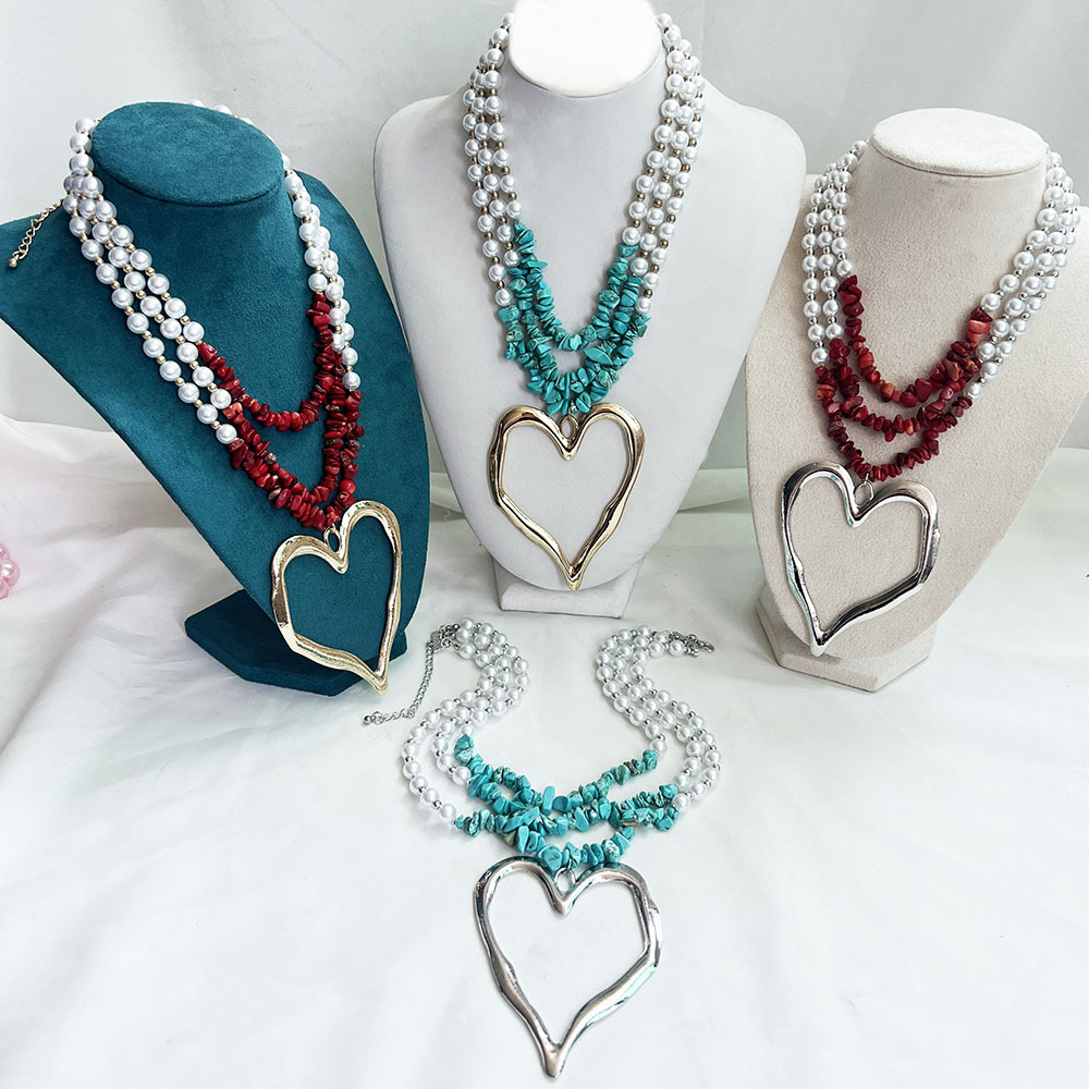 85g Weight Alloy Pendant Material Three Layer Necklace Classification Imitation Pearl Chain Material Beaded Chain Chain Type 1 Piece Quantity Casual, Party Occasion Imitation Pearl, Alloy Material Heart Shape Pattern Unisex Gender Exaggerated, Streetwear Style Exaggerated Streetwear Heart Shape Imitation Pearl Alloy Beaded Chain Statement Necklaces Wholesale 1