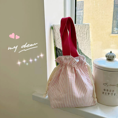 Cute drawstring storage bag, cuffed handbag, portable and cute water cup bag, fashionable outing sundries, women's makeup bag