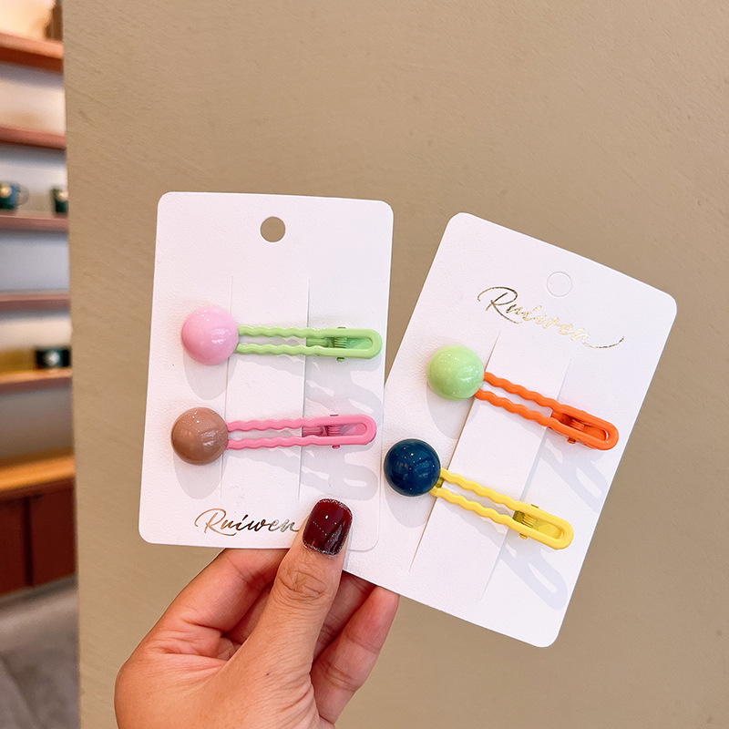 Korean girl hair clip color wavy bean duckbill babies candy candy…