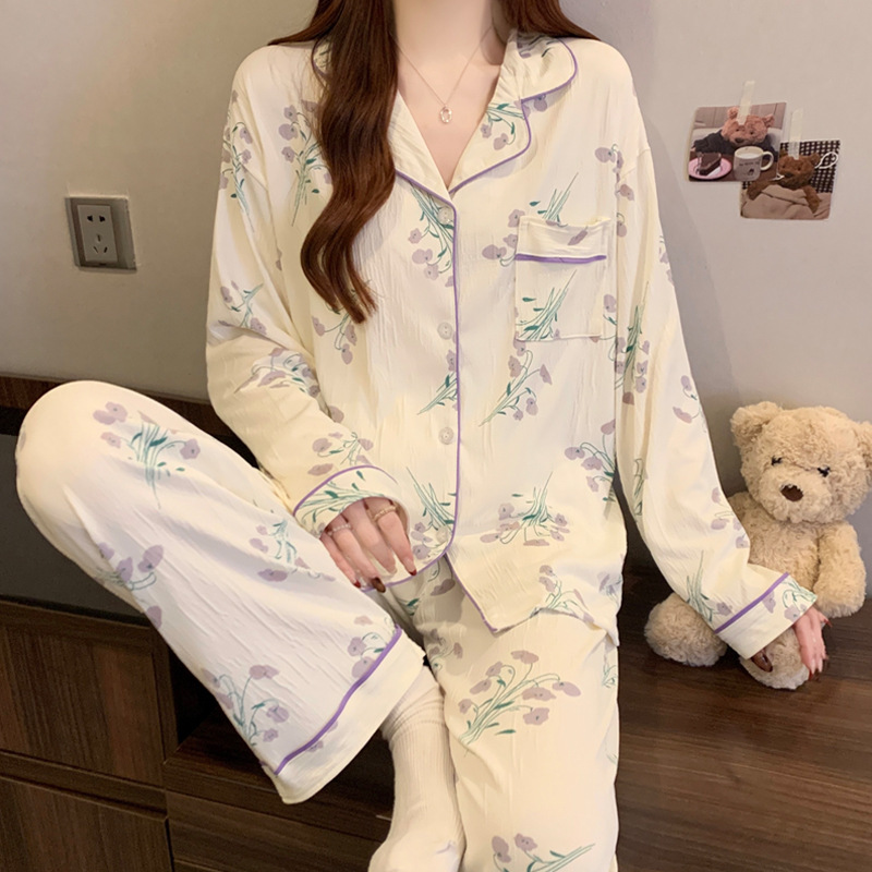 蝶結びのさくらんぼのプリントの女性のパジャマの春と秋の新型のカーディガンの長袖のズボンの部屋の服のスーツは実際に卸売りをたたきます。|undefined