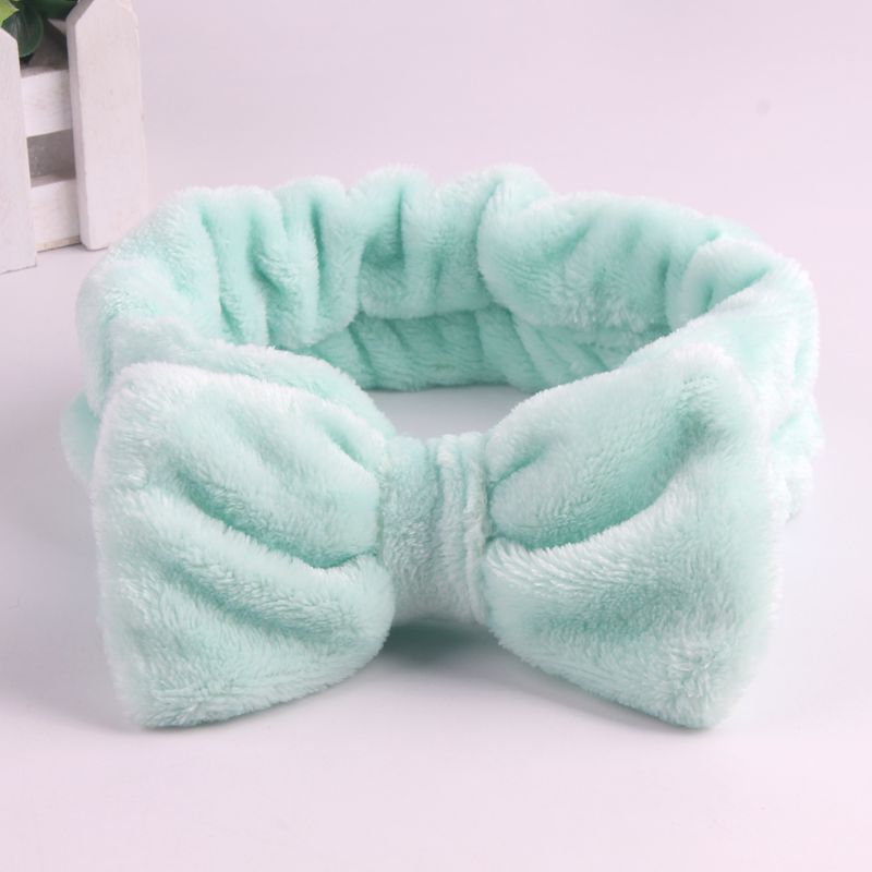 Coral hairgrip with bow