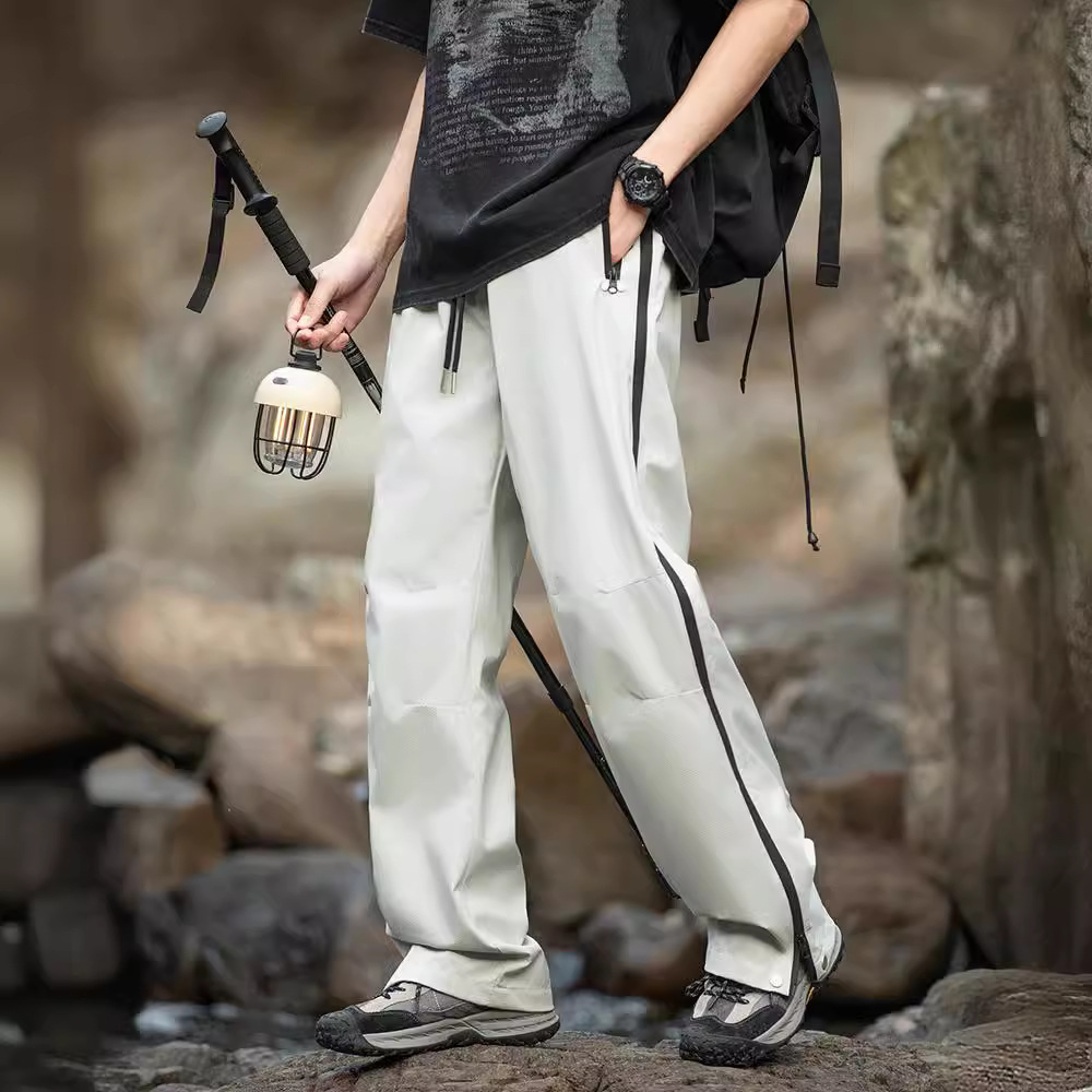 IZEXX marca de moda verano montaña al aire libre tres pantalones de asalto impermeables de secado rápido viajes deportes pantalones de ocio hombres