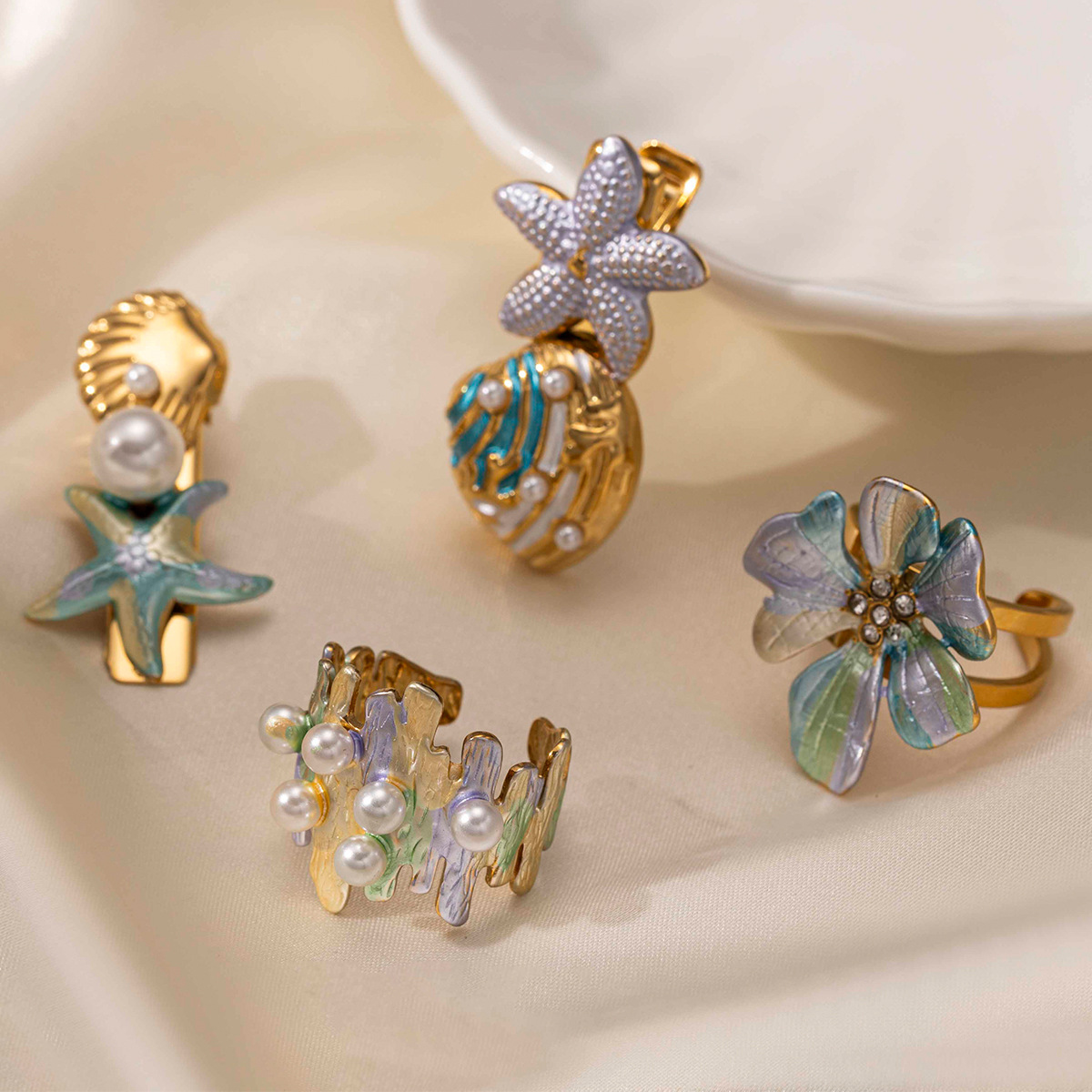 Tena anillo de acero inoxidable europeo y americano femenino no se desvanece mar playa viento horquilla anillo conjunto flores transfronterizas joyas