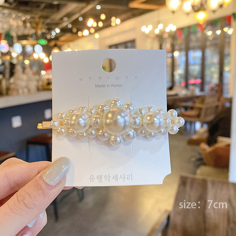 Pasador de pelo de perlas de alta gama estilo francés para mujer, clip para flequillo lateral, elegante clip para el pelo de la frente, accesorio para el pelo tipo pico de pato.