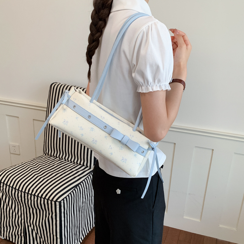 Nicho coreano bolsas de flores trituradas 2026 nueva moda versátil bolsas de brazo sensación diaria bolsas de hombro