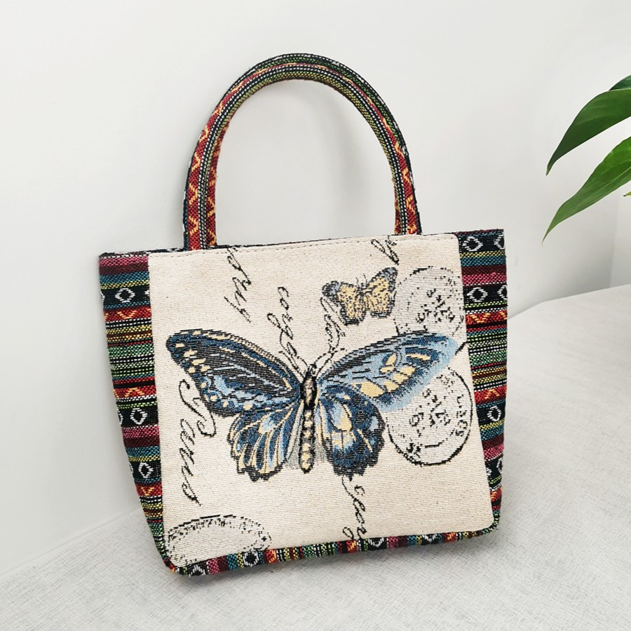 Nuevo retro con Jacquard de oro dorado de doble cara encriptado y engrosado bordado bolso de mano de vela nacional bolso de mano