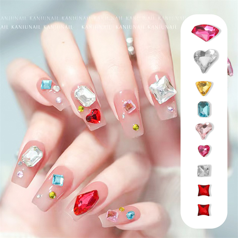 Internet celebridad mono mismo estilo de uñas arte material paquete puntiagudo Fondo hacha en forma de corazón K9 diamante uñas joyas de uñas mixtas
