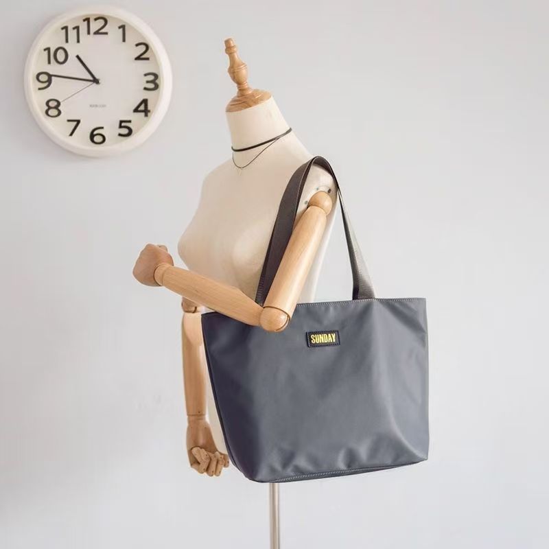 2025新型トートバッグ女性大容量シンプルオックスフォードナイロン布バッグ