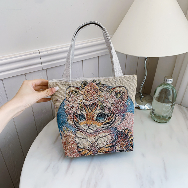 新しいファッショナブルで多用途なカジュアルな気質の女性のキャンバス両面ゴールデンシルクジャカード刺繍蝶ハンドバッグママバッグ|undefined