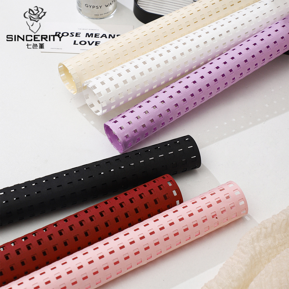 Cuatro colores cordier luz en el espejo de papel de embalaje hueco engrosado flor DIY paquete de flores materiales de arte floral