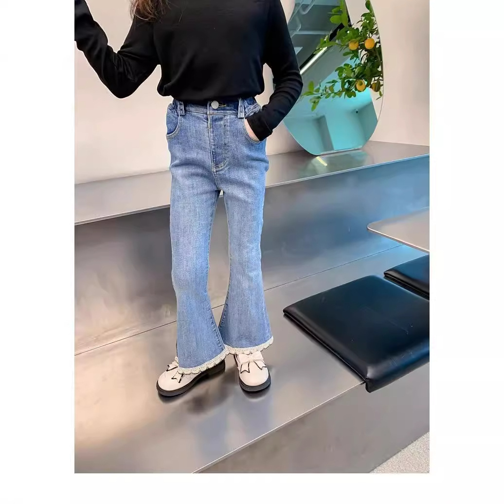 Tendencia de nuevos pantalones infantiles primavera y otoño estilo extranjero pantalones casuales de otoño sueltos pantalones vaqueros de otoño de niña