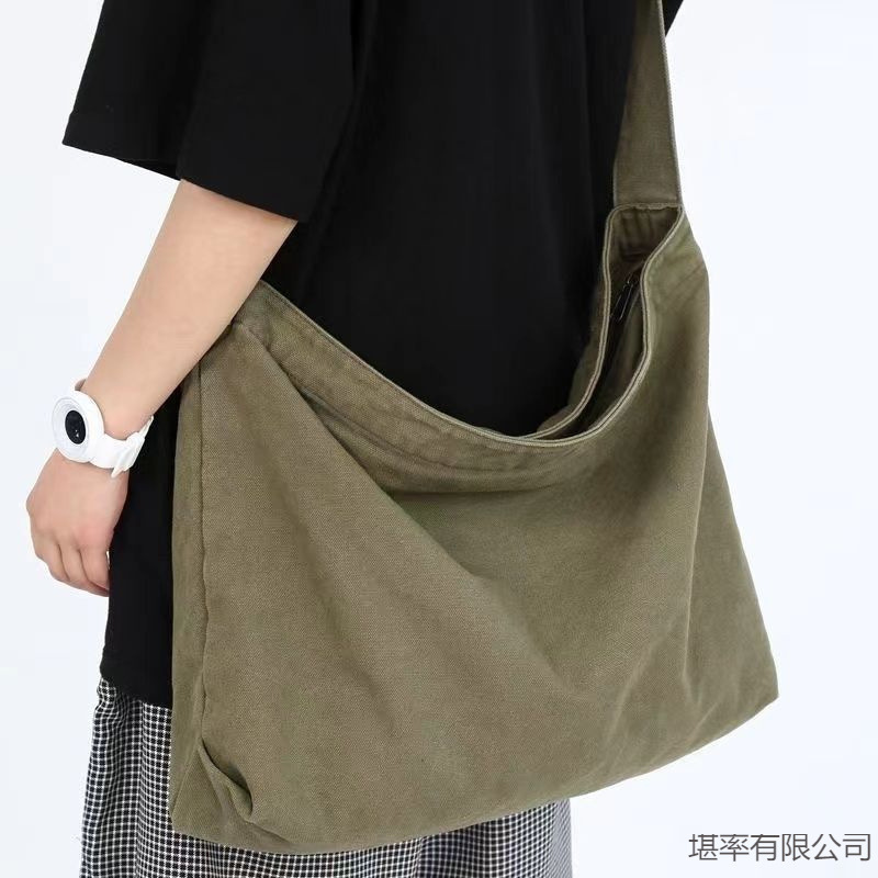 大容量の学生のレトロな斜め掛けのリュックサックのリュックサックの授業中に出勤して男女を包みます。|undefined