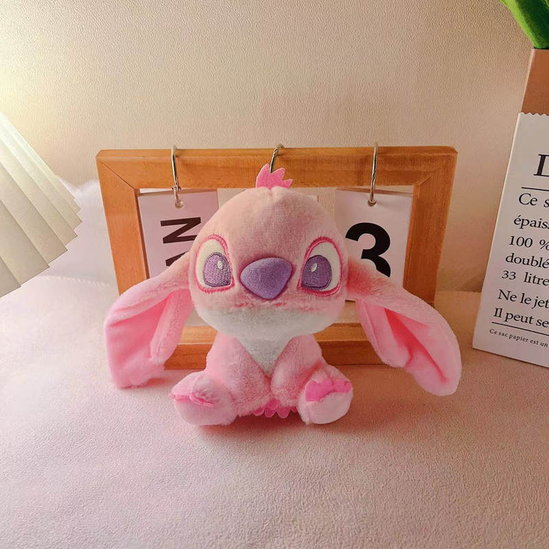 Tiktok estrella caliente bebé púrpura puntada felpa muñeca llavero colgante lindo de dibujos animados bolsa adornos