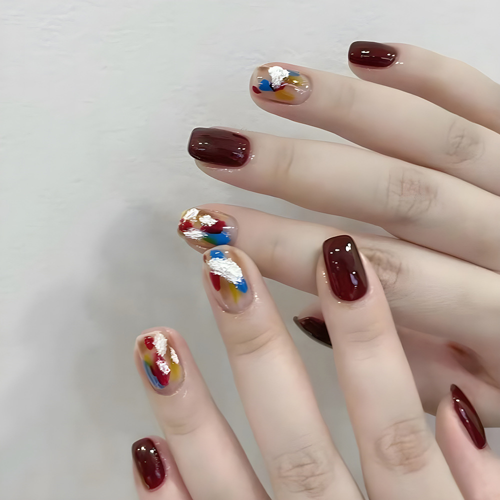 Arte de uñas al por mayor para Año Nuevo, arte de uñas hecho a mano con tendencia nacional roja del Año de la Serpiente, pegatinas de uñas con efecto ojo de gato y fuegos artificiales con un toque de alta gama.